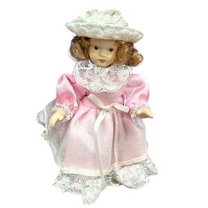 Pink Porcelain Doll with Lace Dress